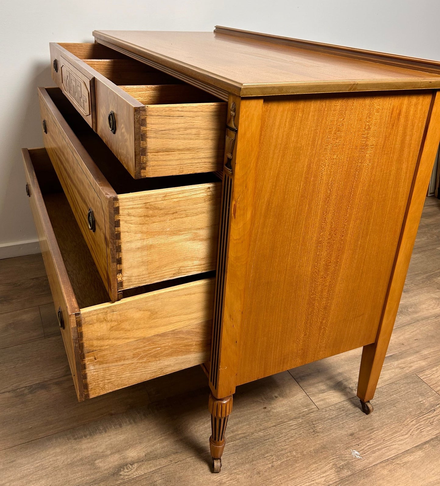 Neoclassical Style Inlaid Flame Birch Dresser – Antique Empire Chest with Star and Urn Carvings
